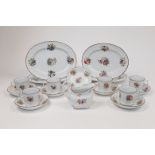 A Coalport porcelain part tea set, 19th century, unmarked, moulded with swags and cartouches and ...
