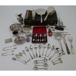 A group of mixed silver, to include: a four piece silver mounted dressing table set, Birmingham, ...