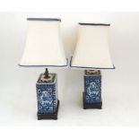 A pair of modern Chinese lamps, of rectangular form painted to the sides in underglaze blue with ...
