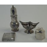 A small group of silver and white metal, comprising: an Edwardian silver sugar caster, London, 19...