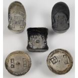 Five Chinese ingots, each bearing Chinese character seal stamps, contained in a blue lined box (5)