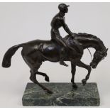 A bronze figure of a horse and jockey, late 19th / early 20th century, in the manner of John Will...