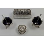 A small group of silver, comprising: a Victorian silver heart-shaped pill box and cover, London, ...