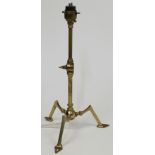 A brass student’s lamp, 20th century, the slender adjustable stem on angular tripod feet, convert...