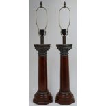 A pair of Indian bronze and hardwood Corinthian column table lamps, late 20th century, each taper...