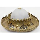 A large gilt metal and frosted glass ceiling light, 20th century, the frosted glass shade held in...
