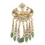 A gem-set filigree earring, Spain or Morocco, 19th century, with seed pearls and emerald, mounted...