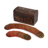 A complete set of lacquered papier-mache circular game cards (Ganjifa) in their original box, Ind...
