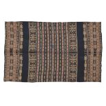 A cotton textile, Indonesia, 20th century, woven in dark blue, cream, red and lighter blue, with ...