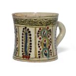 A Kutahya pottery cup, Ottoman Turkey, 18th century Of slightly flared shape, the body decorated...