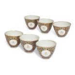 A set of six Ottoman porcelain zarf cups, Turkey, 19th century, decorated to exterior with a fish...