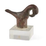 A silvered bronze figure of a bird, probably a thumbrest, Persia, 12th century, depicted with its...