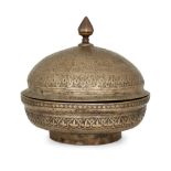 An engraved bronze lidded vessel, India, 17th century, the base on a short foot, engraved with re...