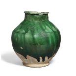 A Group of Important Works - To be sold Without Reserve An intact green-glazed Fatimid pottery j...