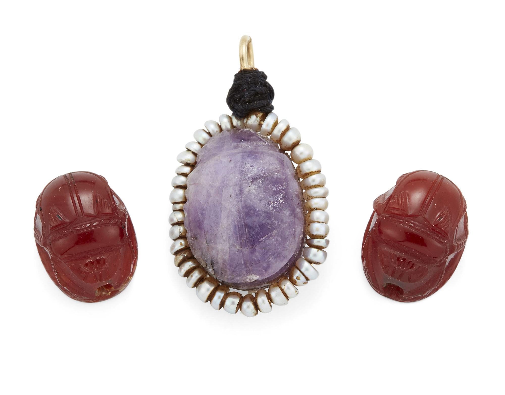 An Egyptian amethyst scarab with delineated wing-case, probably New Kingdom, 1.9cm long, set with...