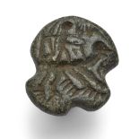 A Jemdet Nasr grey stone engraved stamp seal, with pierced lug, circa 3rd Millennium B.C., 3cm diam