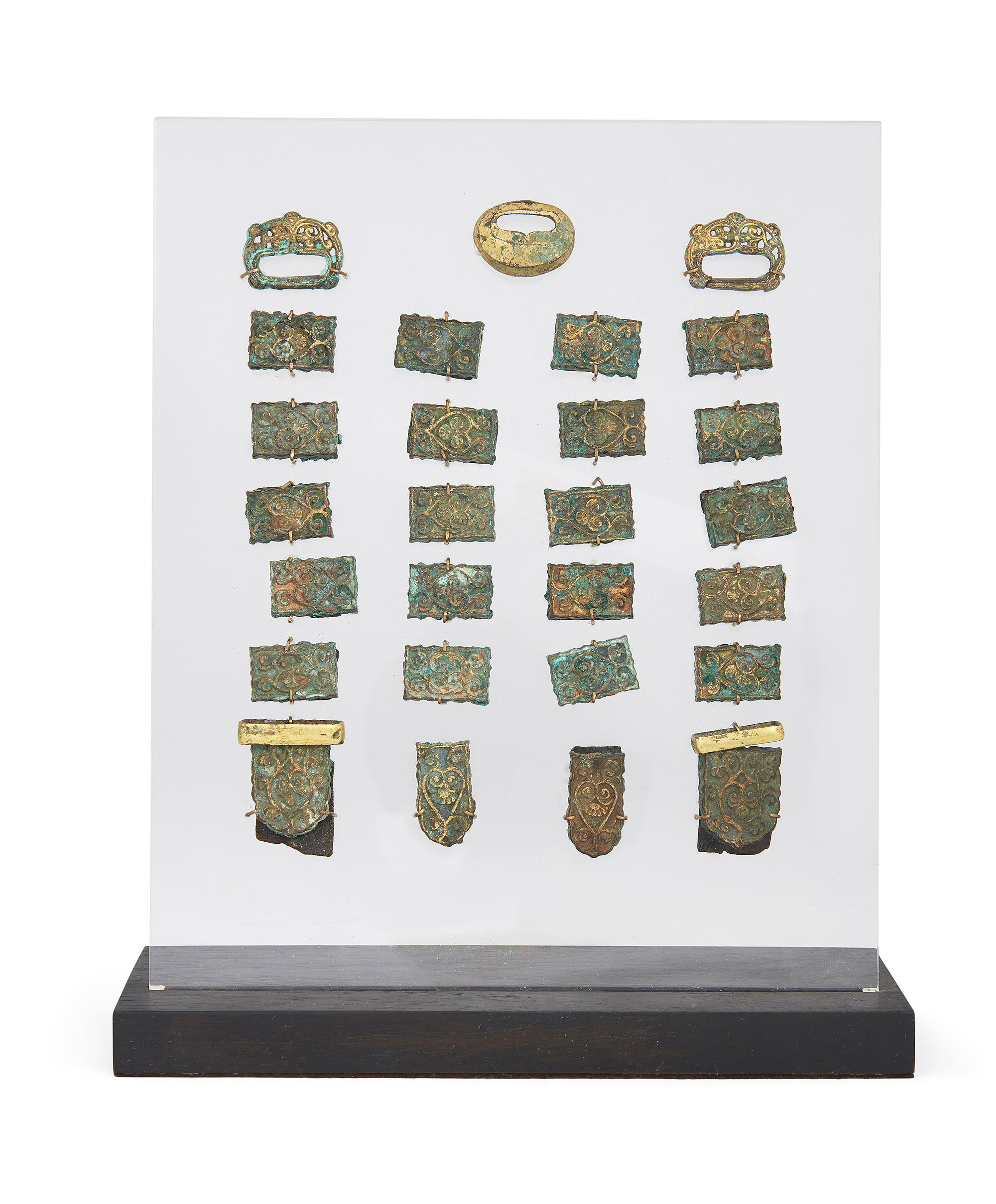A group of Ilkhanid gold harness fittings, Iran, 13th century, comprising twenty rectangular plaq...