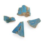 Four Egyptian New Kingdom bright blue glazed faience inlay or tile fragments, each inscribed or p...