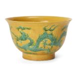 A Chinese yellow-ground green-enamelled 'dragon' bowl Late Qing dynasty, apocryphal Yongzheng ma...