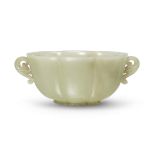 A Chinese Mughal-style pale celadon jade lobed twin-handled bowl Qing dynasty, 17th/18th century...