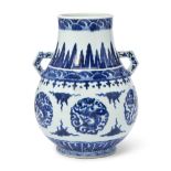 A large Chinese blue and white twin handled vase, hu Qing dynasty, 18th century The sturdily po...