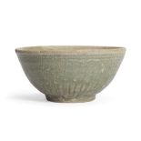 A Thai Sawankhalok celadon-glazed bowl Sukothai/Ayutthaya, 14th/15th century The thickly-potted...