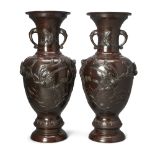 A pair of Japanese bronze baluster vases Meiji period, early 20th century Decorated in relief w...