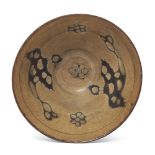 A Chinese Jizhou-type 'papercut' bowl 20th century Of rounded conical shape raised on a short f...