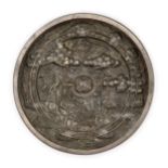 A Japanese bronze 'cranes and pine' circular mirror Edo Period Decorated with two cranes beneat...