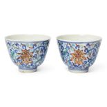 A pair of Chinese doucai ‘lotus’ cups Qing dynasty, Guangxu six-character marks and of the perio...