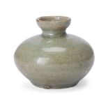 A Korean celadon-glazed cosmetic jar Goryeo dynasty, 12th century With gently rounded sides ris...