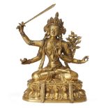 A magnificent Tibetan gilt bronze figure of Chaturbhuja Manjushri, Namasangiti 18th century The...