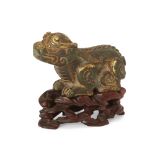 A Chinese parcel-gilt bronze 'bixie' weight Song-Ming dynasty Finely cast as a recumbent beast ...