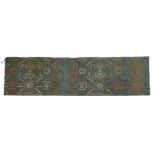 Fragments of a Chinese silk brocade and a Ikat panel  18th - 19th century Comprising: a blue gr...