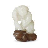 A Chinese white and brown jade two-tone carving of Liu Hai  Qing dynasty, 18th/19th century The...