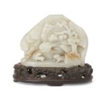 A Chinese pale celadon jade 'Mountain' boulder carving Qing dynasty, 18th/19th century  The pal...