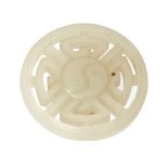 A Chinese white jade button Qing dynasty, 18th century Carved and pierced as a taijitu set on a...