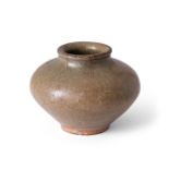 A Chinese grey stoneware celadon jarlet Yuan dynasty Of compressed form with slightly everted r...