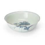 A Chinese blue and white 'pomegranate' carved shallow bowl Ming dynasty, Wanli period Painted t...