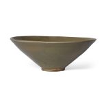 A Chinese Yaozhou celadon-glazed conical bowl Song dynasty Covered in an olive-green glaze, gla...