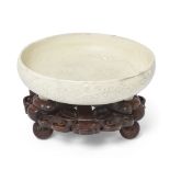 An unusual Chinese Cizhou-type 'lotus' tripod narcissus bowl Ming dynasty, 15th century Standin...