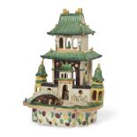 A Chinese famille verte biscuit model of a temple Qing dynasty, Kangxi period The three-storied...