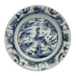 A Chinese Zhangzhou (Swatow) blue and white 'phoenix' dish Ming dynasty, 16th century The thick...