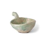 A Chinese green glazed handled pottery bowl Han dynasty Applied with over all with lustrous gla...