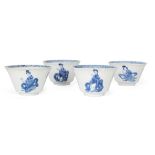 Four Chinese blue and white 'ladies and boys' tea cups Qing dynasty, Kangxi period, apocryphal C...