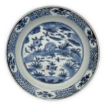 A Chinese Zhangzhou (Swatow) blue and white 'deer' dish Ming dynasty, 16th century With a flare...