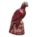 A Chinese moulded flambé-glazed eagle Qing dynasty, Jiaqing period With hollow base, moulded st...