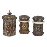 A pair of Chinese silver filigree covered jars and a similar covered jar Mid-20th century The p...