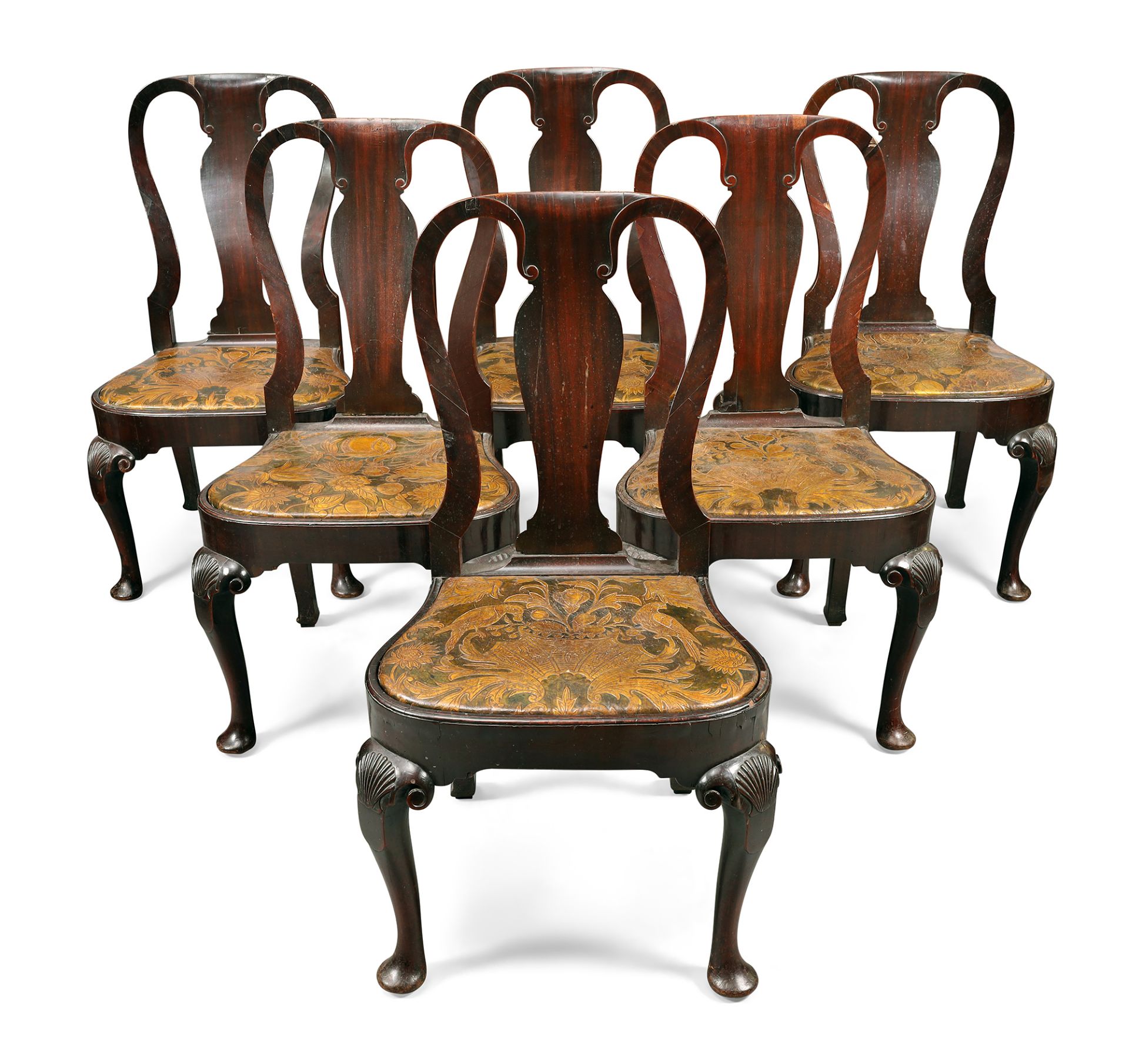 A set of six George II walnut dining chairs, second quarter 18th century, possibly Irish, the sha...