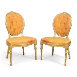 A pair of George III giltwood side chairs, last quarter 18th century, in the French taste, with b...